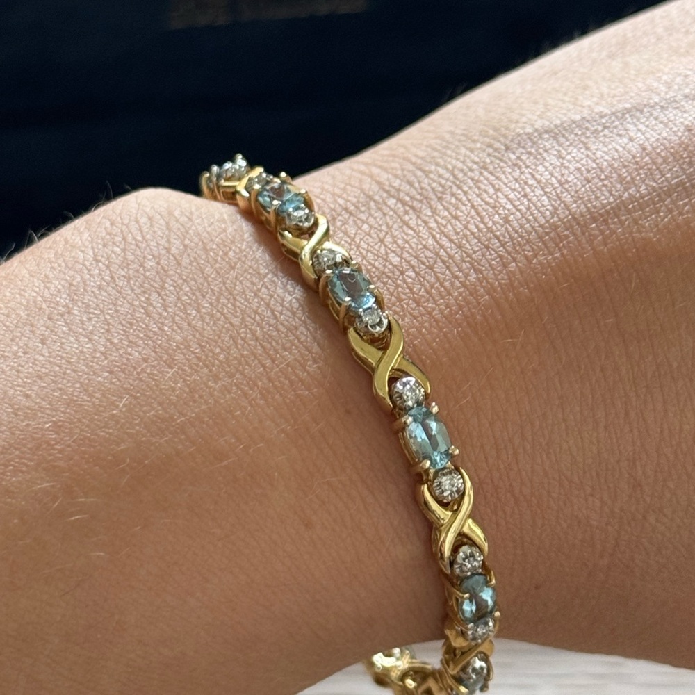Elegant 14K Gold and Blue Topaz Bracelet